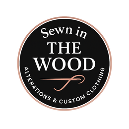 Official brand logo for Sewn In The Wood luxury custom couture and formalwear.